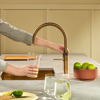 Quooker FNRPTB Fusion Round Patinated Brass Tap with COMBI 2.2-EQ B Tank Patinated Brass Boiling Water Tap 